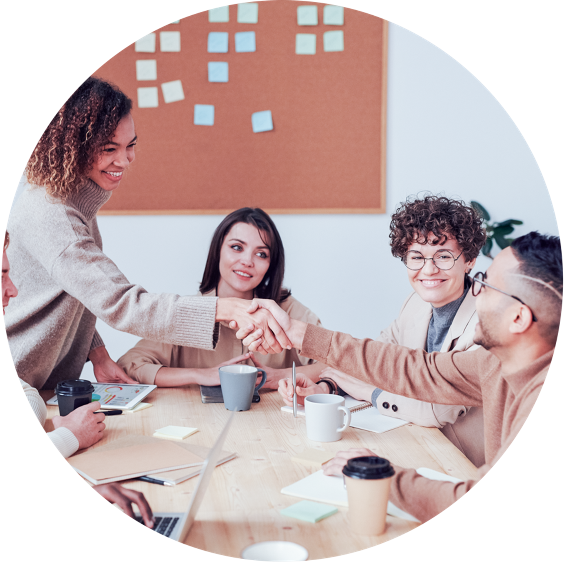 Group of people sitting indoors.png